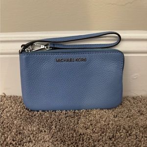 Michael Kors- blue wristlet, never used but don’t have the tags